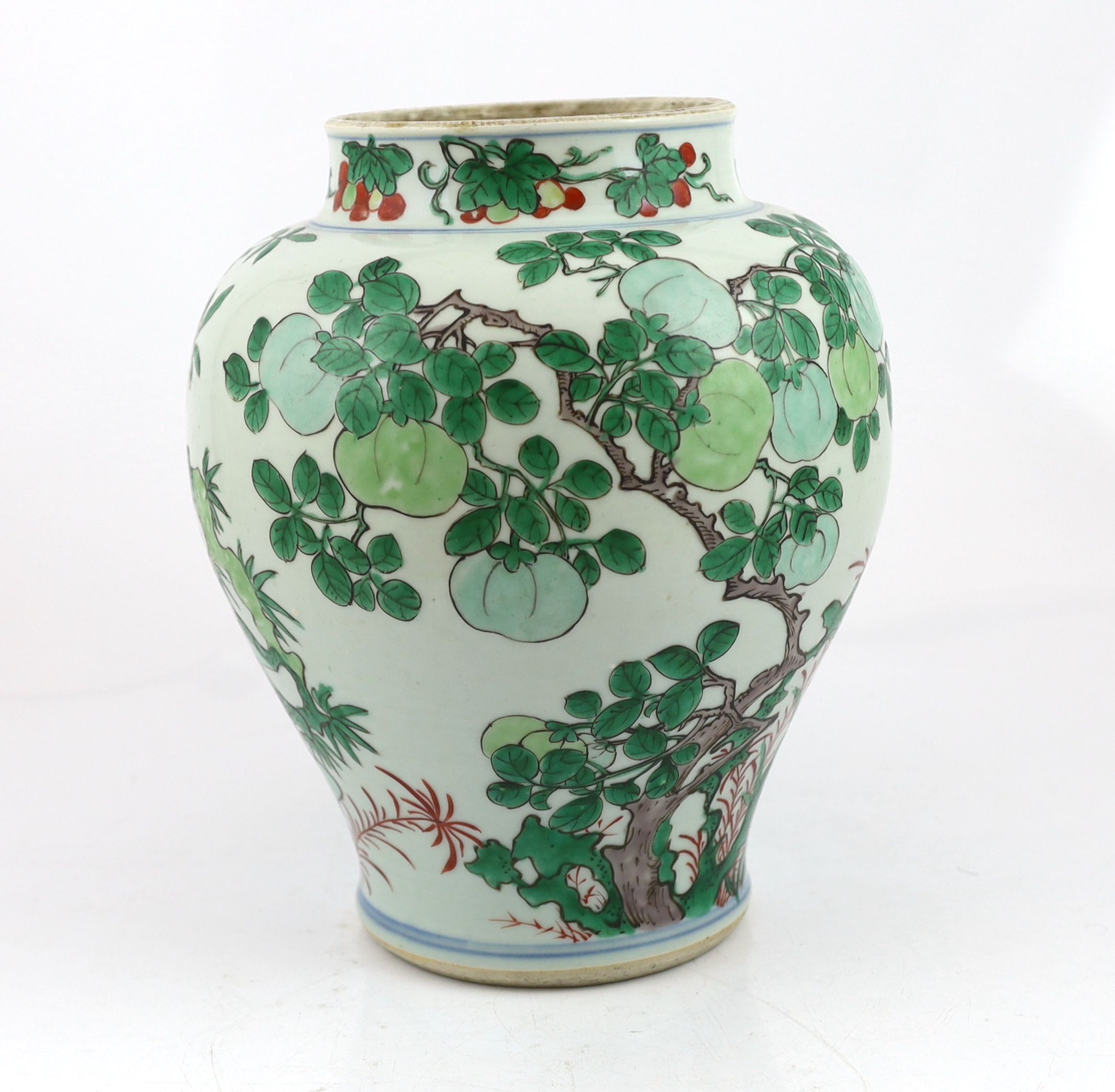 A Chinese wucai ‘pomegranate’ baluster vase, Transitional, Shunzhi period, c.1650